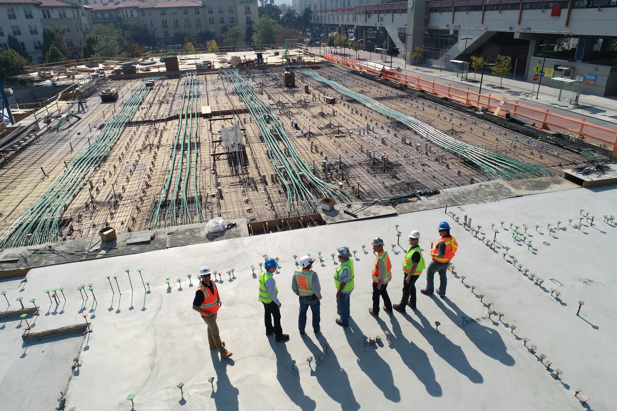 Project team reviewing progress on a large construction site